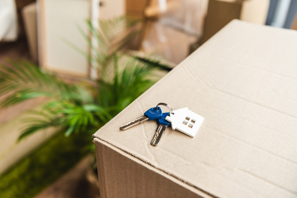 House keys on cardboard moving box — professional removals Harrogate
